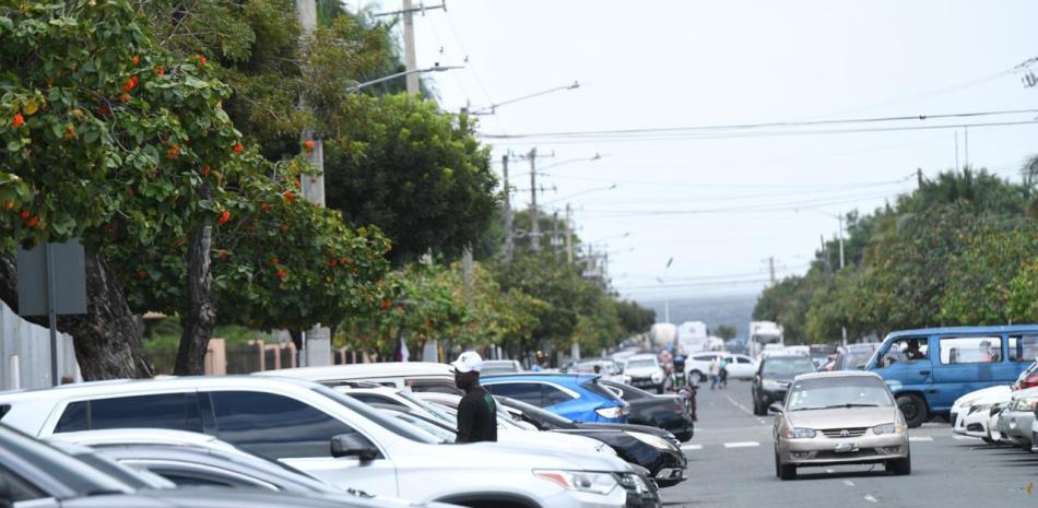 GANANCIAS DE PARQUEADORES INFORMALES EN RD